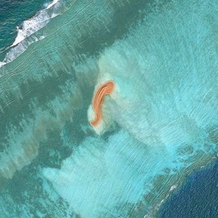 A satellite image of Eldad Reef in the Spratly Islands taken on Wednesday. Photo: Maxar Technologies Handout via AFP
