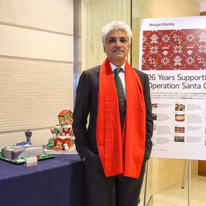 Gokul Laroia, CEO Asia-Pacific of Morgan Stanley, with some of the cakes made to raise funds for Operation Santa Claus.
Photo: Edmond So