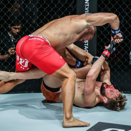 Anatoly Malykhin delivers hammer fists to finish Reinier de Ridder. Photos: ONE Championship