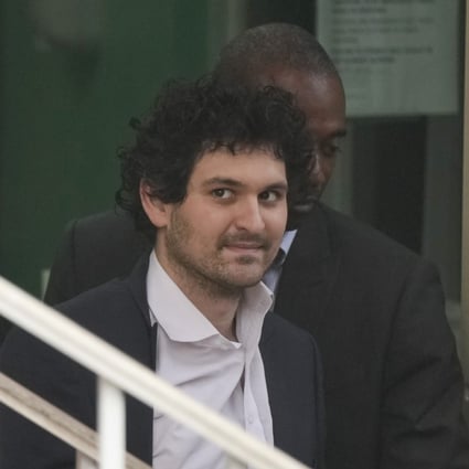 FTX founder Sam Bankman-Fried, being escorted from the Magistrate Court in Nassau, Bahamas. Photo: AP