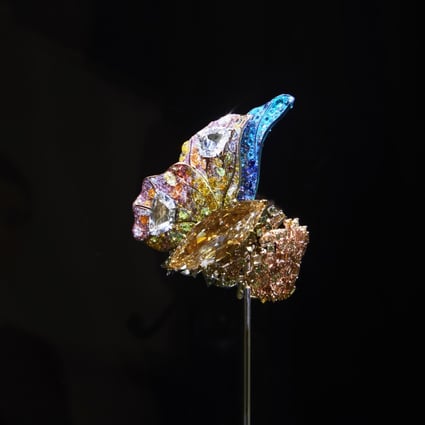 Metamorphosis butterfly with trapezoid diamonds and marquise brown diamonds, on display at TEFAF 2022. Photo: Handout