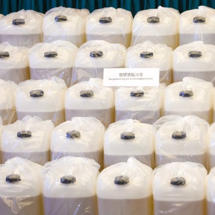 Hong Kong customs displays HK$1.1 billion worth of liquid methamphetamine, disguised as cartons of coconut water. Photo: Yik Yeung-man





