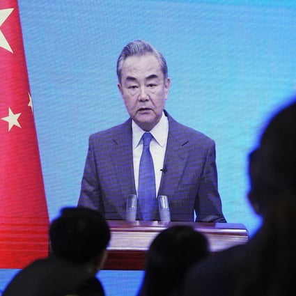 Chinese Foreign Minister Wang Yi says China will stay committed to its fighting spirit in 2023. Photo: Kyodo