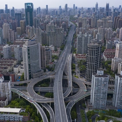 Shanghai, seen here with empty roads amid citywide lockdowns in April, plans to tap into its fiscal reserves amid a revenue shortfall. Photo: Bloomberg