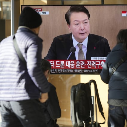 A TV screen at a Seoul railway station shows South Korean President Yoon Suk Yeol speaking in a cabinet meeting on Tuesday, a day after the nation accused North Korea of flying drones across the tense border for the first time in five years. Photo: AP