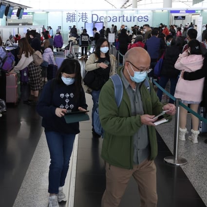 Passengers check in for their flight at the Cathay Pacific Airline Check in counter at Hong Kong International Airport. Photo: SCMP / Yik Yeung-man