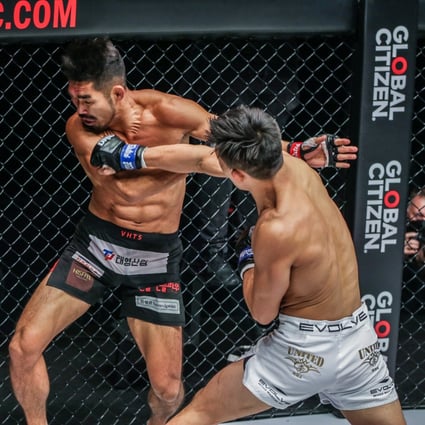 Christian Lee lands a punch on Ok Rae-yoon in their rematch at ONE 160 in Singapore. Photo: ONE Championship