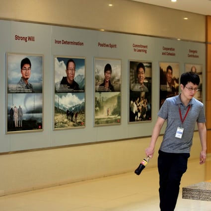 A man walks past a board at a training centre inside Huawei Technologies Co’s headquarters in Shenzhen on May 31, 2019. The company had hired more than 300 recruits under its “Genius Youth” programme. Photo: Reuters
