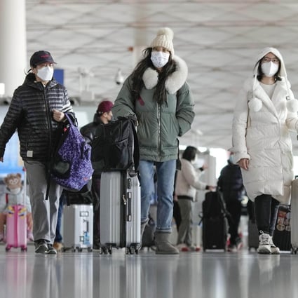 Travellers at a departure lobby at Beijing Capital International Airport on Tuesday. US health officials said that starting on January 5, passengers arriving from China will be required to test negative for Covid-19 tests before being permitted to enter, according to reports. Photo: Kyodo