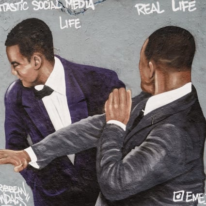 Remember THAT moment Will Smith smacked Chris Rock at the Oscars? Picutred is a graffiti mural showing the scene that took place at the Academy Awards. What other pop moments have you missed from 2022? Photo: EPA