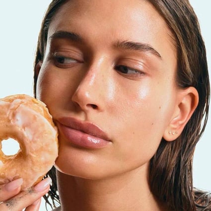 Hailey Bieber made the “glazed donut look” one of the top beauty trends of 2022.