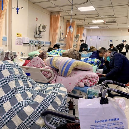 Patients at a hospital in Tanghan on Friday. China has seen a surge in cases since it lifted controls earlier this month. Photo: AFP