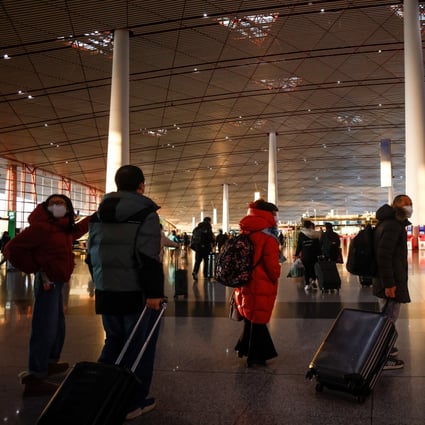 Travellers at the Beijing Capital International Airport. China will lift all border controls on January 8. Photo: EPA-EFE 