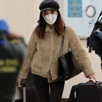 A passenger of a flight from Beijing leaves the terminal after landing at the Adolfo Suarez Madrid-Barajas airport on the outskirts of Madrid, on December 31, 2022. Photo: AFP/File