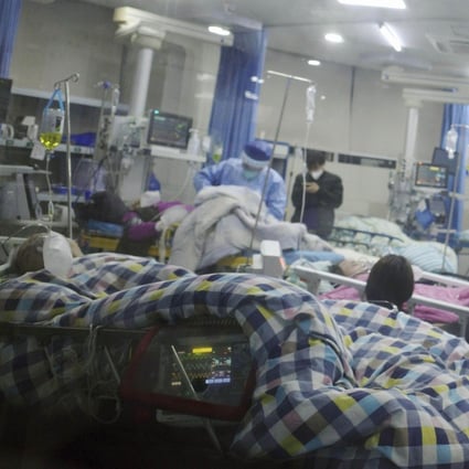 Elderly patients lie on emergency department beds at a hospital in Wuhan on December 28, 2022, amid a surge in Covid-19 cases. Photo: Kyodo