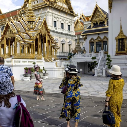 Tourists at the Grand Palace in Bangkok on July 18. The return of Chinese tourists will boost economies such as Thailand’s and support their currencies. Photo: AFP