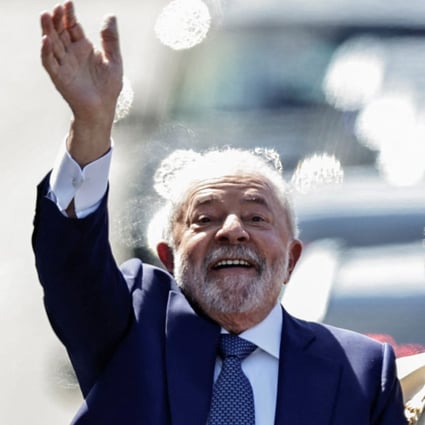 Brazil’s President elect Luiz Inacio Lula da Silva waves to supporters on the day of his swearing-in ceremony in Brasilia on Sunday. Photo: Reuters