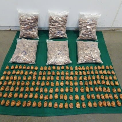 Hong Kong Customs display the suspected smuggled dried abalone they seized during an operation. Photo: Handout