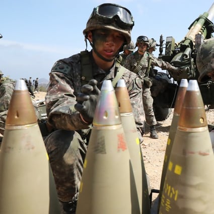South Korean soldiers arrange 155mm howitzer shells during a military exercise in Goseong in April 2016. Photo: Newsis via AP