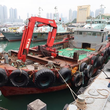 Police and customs officers intercepted this cargo ship off Cheung Chau during an anti-smuggling operation. Photo: Handout