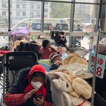 Patients lie on beds in the emergency department of a hospital amid the Covid-19 outbreak in Shanghai on January 5. Reuters