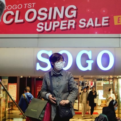 A shopper departs Sogo’s Tsim Sha Tsui department store on January 9, 2023. Photo: Elson Li
