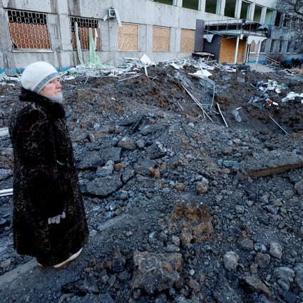 A woman looks at the site of a missile strike that occurred during the night, as Russia’s attack on Ukraine continues, in Kramatorsk, Ukraine on Sunday. Photo: Reuters