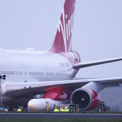 Virgin’s LauncherOne rocket was carried under the wing of a modified Boeing 747 called ‘Cosmic Girl’. Photo: Reuters