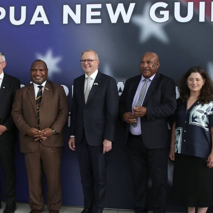 Australian Prime Minister Anthony Albanese, centre, with his Papua New Guinea counterpart James Marape (on his left) and other officials following a meeting. Photo: AFP