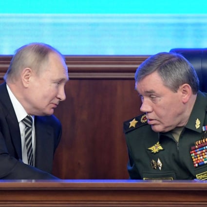 Russian President Vladimir Putin listens to Chief of the General Staff of the Russian Armed Forces Valery Gerasimov during the annual meeting of the defence ministry board in Moscow in December. Photo: Sputnik via AFP