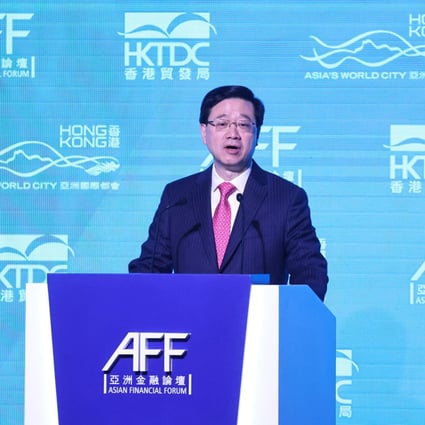 Chief Executive John Lee speaks at the Asian Financial Forum at the Hong Kong Convention and Exhibition Centre in Wan Chai on January 11. Lee promised to “go fast” on the city’s return to normal. Photo: K.Y. Cheng
