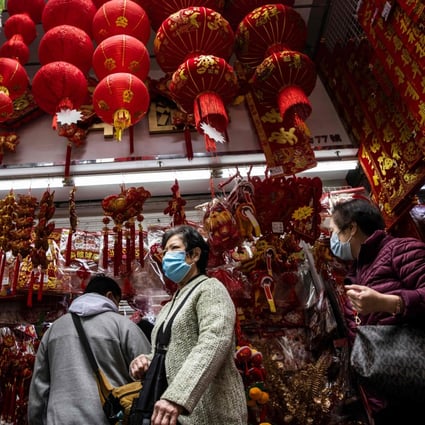 People look at decorations for sale in Hong Kong on January 12, 2023 ahead of the Year of the Rabbit, which begins on January 22. Photo: AFP