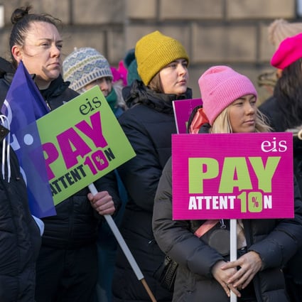 Members of the EIS demonstrate stand outside Bute House in Edinburgh as teachers from secondary schools around Scotland are shut as members of the EIS and SSTA unions take strike action in a dispute over pay. Photo: dpa