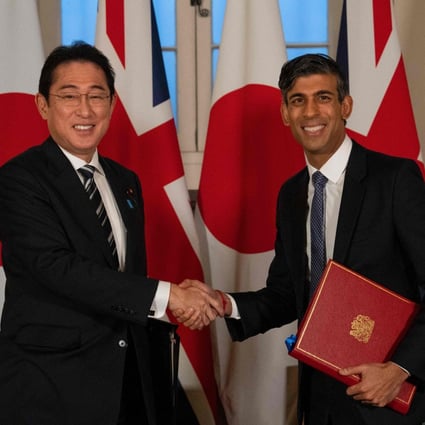 Britain’s Prime Minister Rishi Sunak and Japan’s Prime Minister Fumio Kishida shake hands after signing a defence agreement during a bilateral meeting at the Tower of London. Photo: AFP