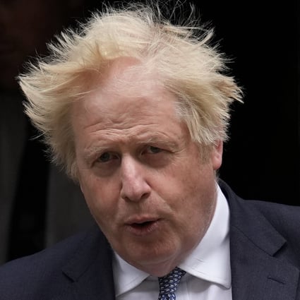 Boris Johnson leaves 10 Downing Street to attend the weekly Prime Minister’s Questions in London in May 2022. Photo: AP