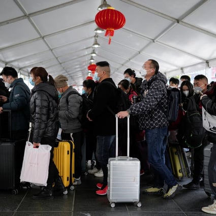 Travellers at a railway station in Shanghai. Foreign investors are yet to buy into China’s reopening story because of concerns about the impact of rapidly growing infection numbers on companies’ growth and earnings. Photo: Reuters