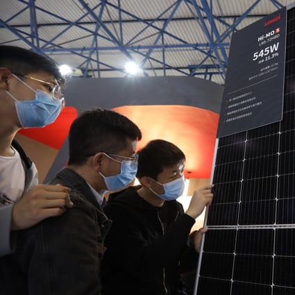Long’s Hi-MO5 bifacial modules are displayed at the Clean Energy Expo in Beijing, in April 2021. Photo: Simon Song
