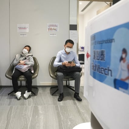 Residents in line to get vaccinated in Tsim Sha Tsui. Photo: Sam Tsang