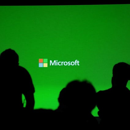 A Microsoft logo seen during the presentation of the Xbox One in Shanghai on July 30, 2014. Photo: AFP