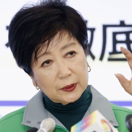 Tokyo Governor Yuriko Koike speaks at a press conference while wearing a polo neck jumper. Photo: Kyodo
