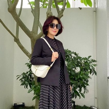 Carina Lau is pictured here with a Dior Bobby, but her luxury handbag collection extends from Hermès Kelly and Louis Vuitton Petite Malle to Bulgari Serpenti Forever. Photo: @carinalau1208/Instagram