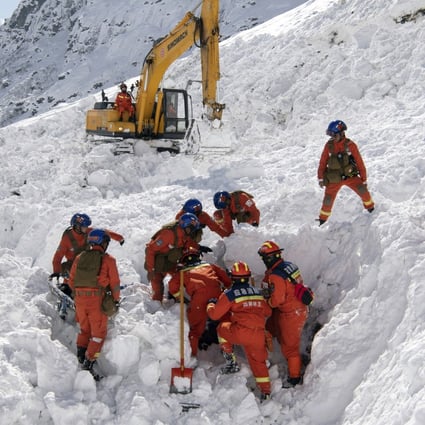 Mechanical diggers take part in the search for survivors following Tuesday’s avalanche in Nyingchi, Tibet. Photo: Xinhua via AP