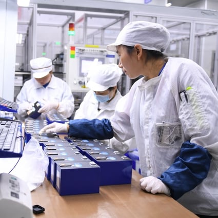 Workers check products at CATL’s factory in Ningde, China’s Fujian province. Photo: Xinhua