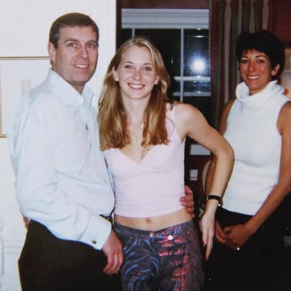 Prince Andrew, Virginia Giuffre and Ghislaine Maxwell in a 2001 photo Maxwell claims to be fake. File photo: AFP