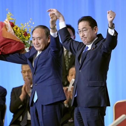 Japan’s Prime Minister Fumio Kishida (right) and his predecessor Yoshihide Suga pictured in 2021. Photo: Kyodo via Reuters