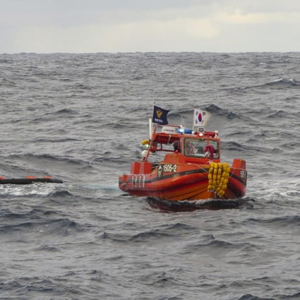 A South Korean coastguard vessel conducts a search operation in the waters between South Korea and Japan. Photo: AP 
