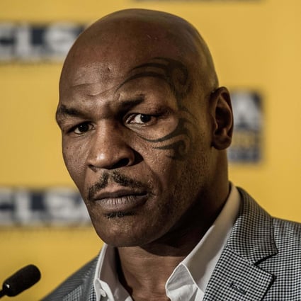 US boxer and former heavyweight world champion Mike Tyson speaks at a press conference in Hong Kong in September 2012. Photo: AFP