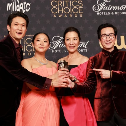 (From left) Harry Shum Jnr, Stephanie Hsu, Michelle Yeoh, and Ke Huy Quan pose with the Best Picture award for Everything Everywhere All at Once at the 28th annual Critics Choice Awards in Los Angeles on January 15. Photo: Reuters