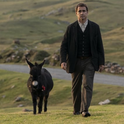 Colin Farrell with his miniature donkey, Jenny, in a still from “The Banshees of Inisherin”. She isn’t the only donkey starring in a new movie - EO is about a donkey journeying through Europe and observing the best and worst of humanity.