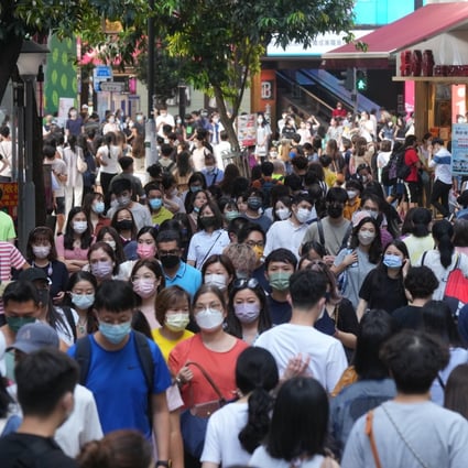 Crowds in Causeway Bay on August 7 last year. A number of economists have made it clear they feel the universal distribution of consumption vouchers is no longer necessary. Photo: Sam Tsang